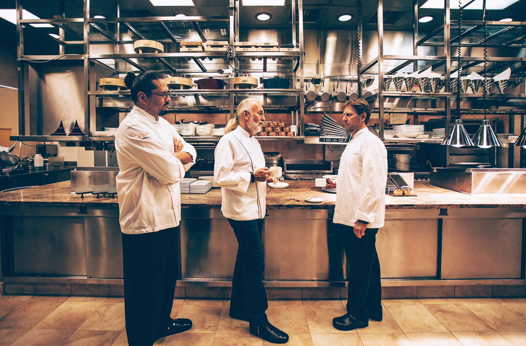 Chef Hubert Keller with his team in the kitchen